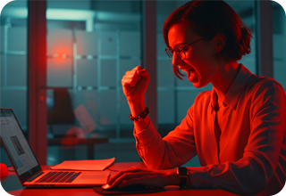 Happy lady working on laptop