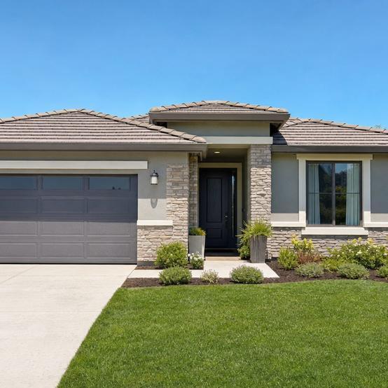 Newer move-in-ready suburban home with a neat lawn and two-car garage